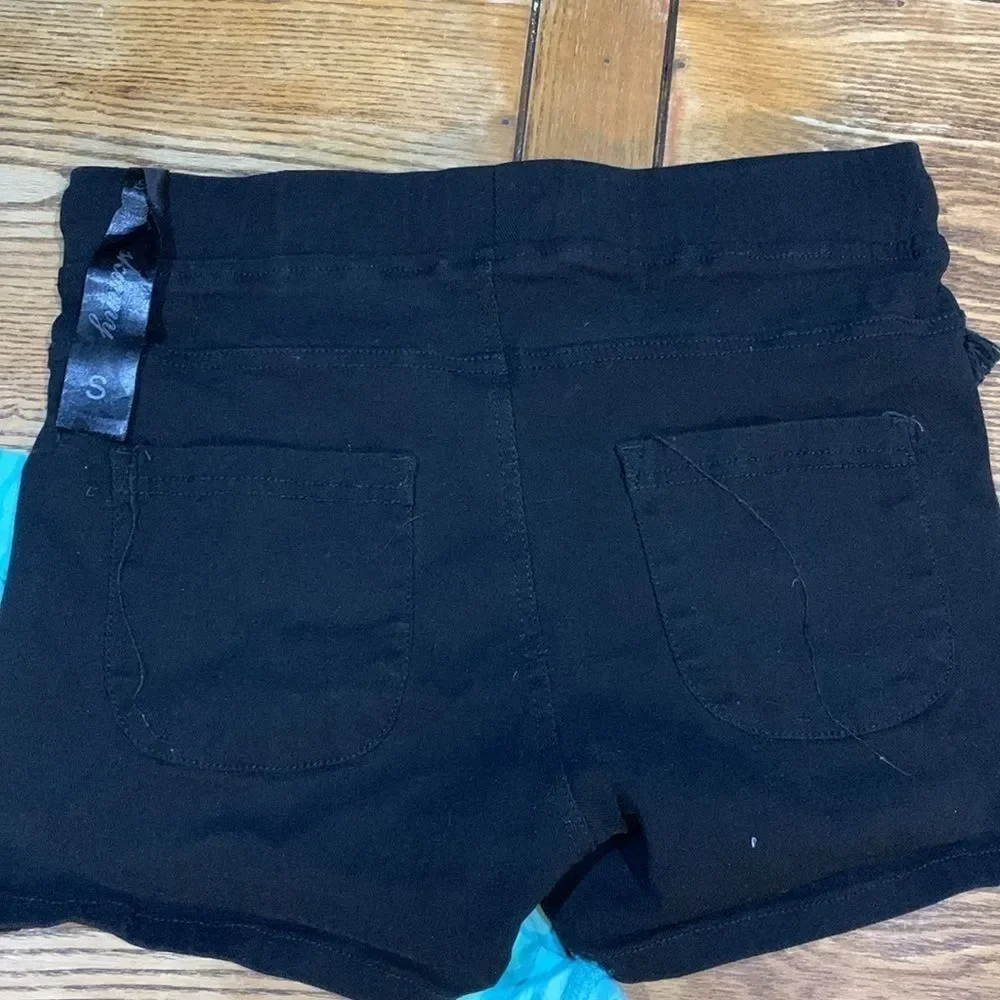 Girls small teal hooded shirt with black small stretchy shorts in box 11